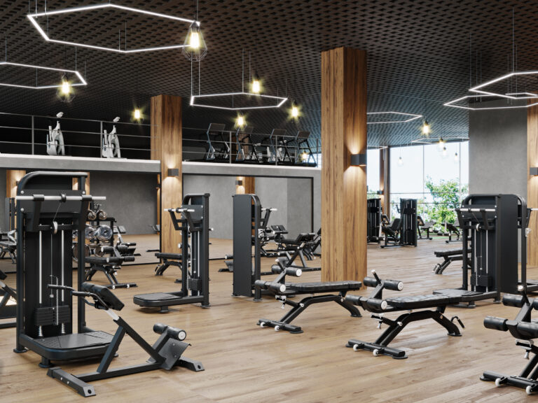 Modern gym interior with sport and fitness equipment, fitness center